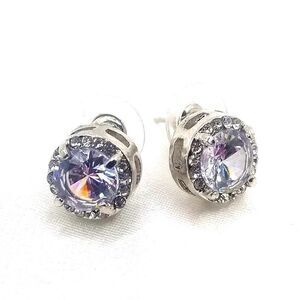 Stainless steel silver toned round sparkling Ryhnstone stud back earrings.